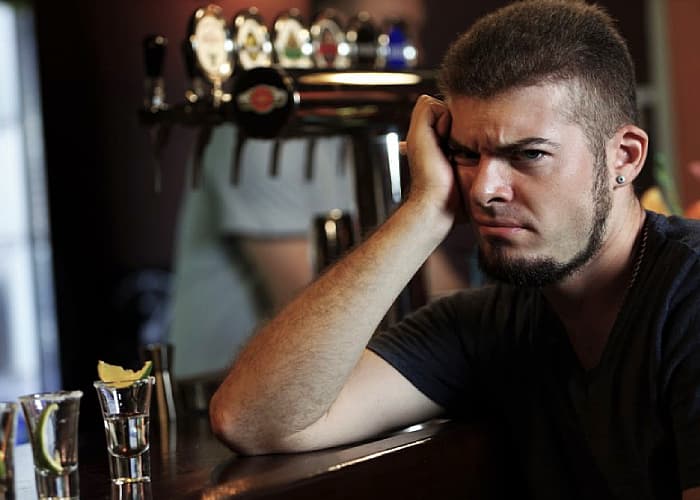 Male having problems with alcohol thingking how many shots of tequila to get drunk