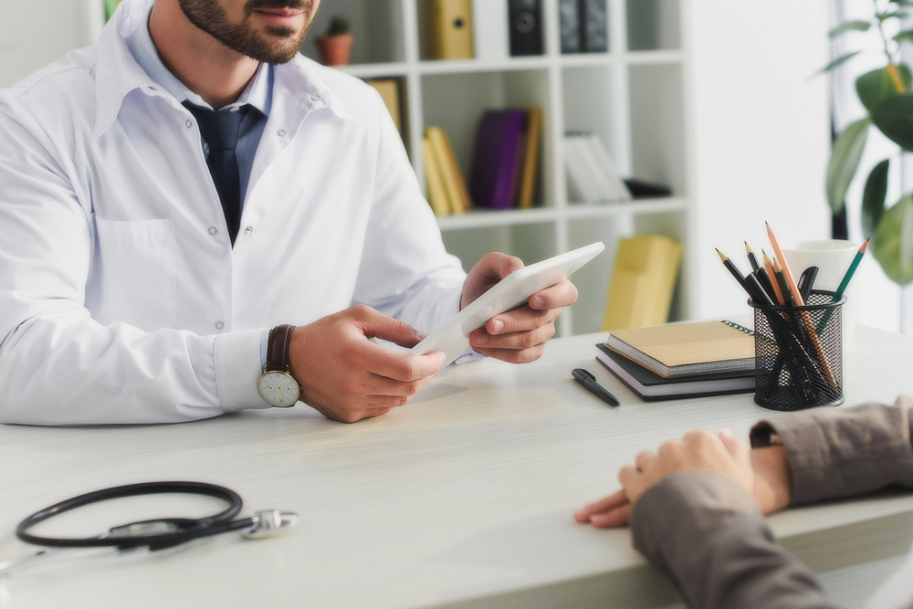 a patient consulting a therapist about drug addiction.